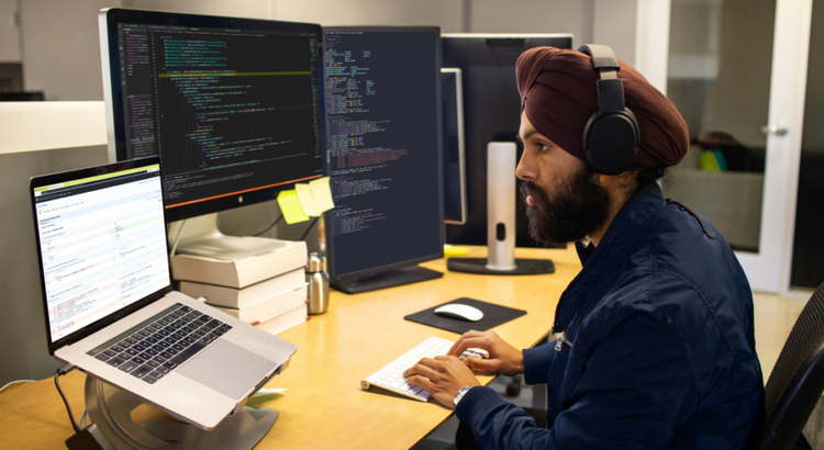 Developers working in an open-plan office