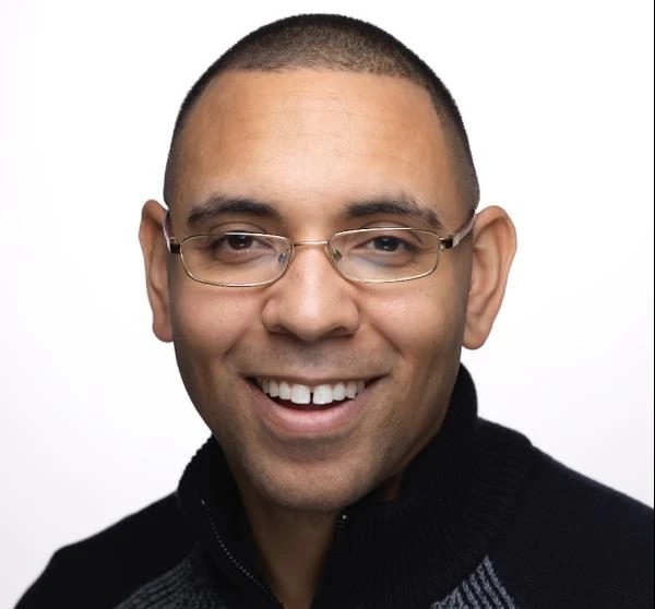 a man smiling for the camera