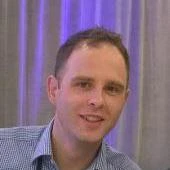a man smiling for the camera