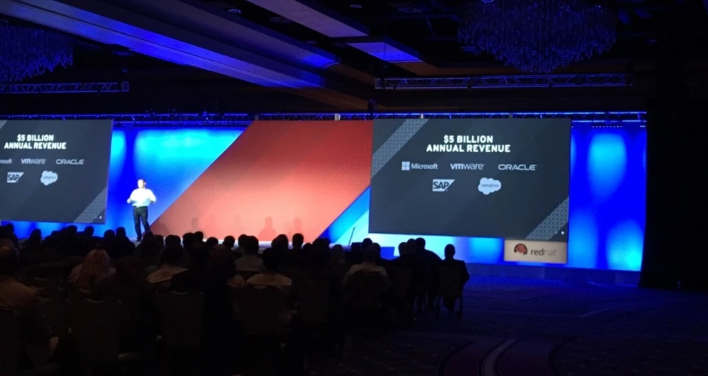 view from the audience of Red Hat NAPC keynote presenter on a large stage