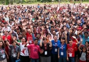 a group of people standing in front of a crowd