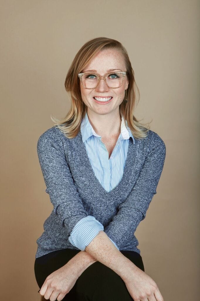 a woman smiling for the camera