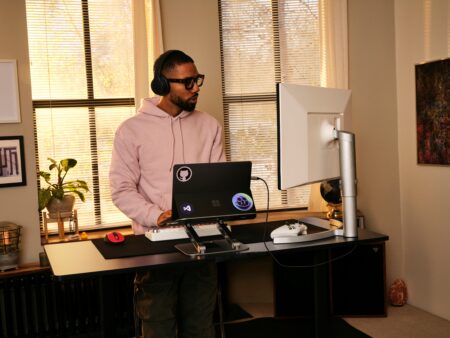 Developer working from home wearing headphones